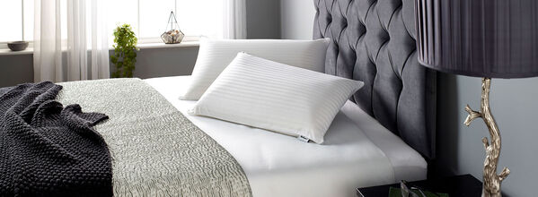 Relyon Natural Superior Comfort Deep Latex Pillows on Bed